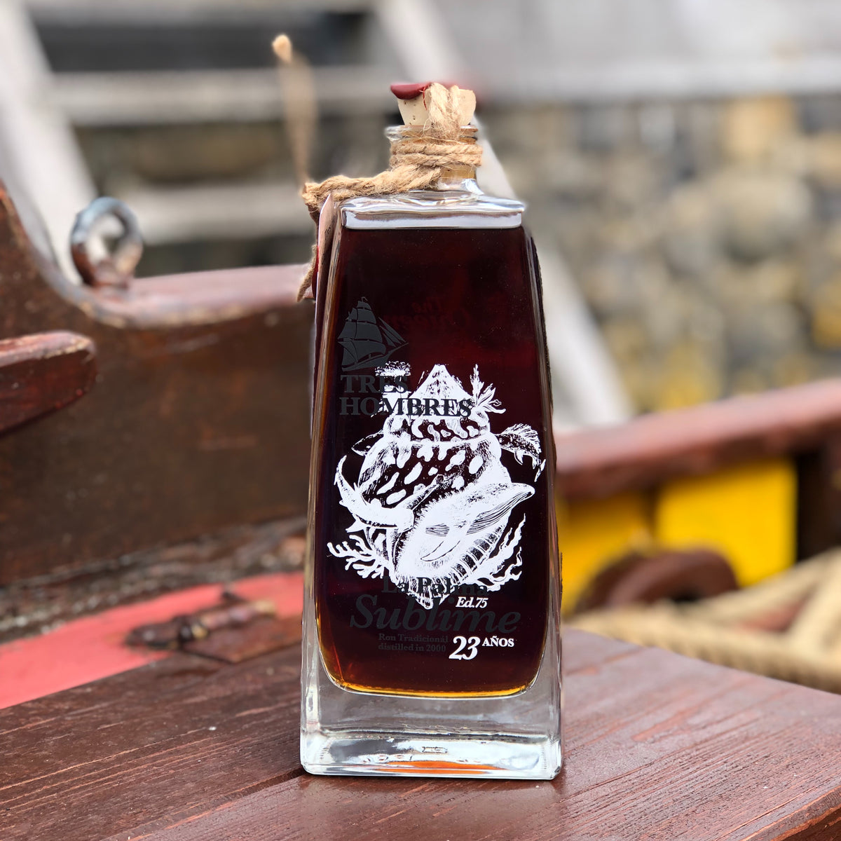 A bottle of the new Tres Hombres Captain's Choice Rum "The Queen". A 23 year-old rum from La Palma, distillery Aldea, transported by engineless sailing vessel Tres Hombres.