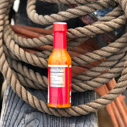 Aunt May' Bajan Pepper Sauce from Barbados. Side of the bottle.